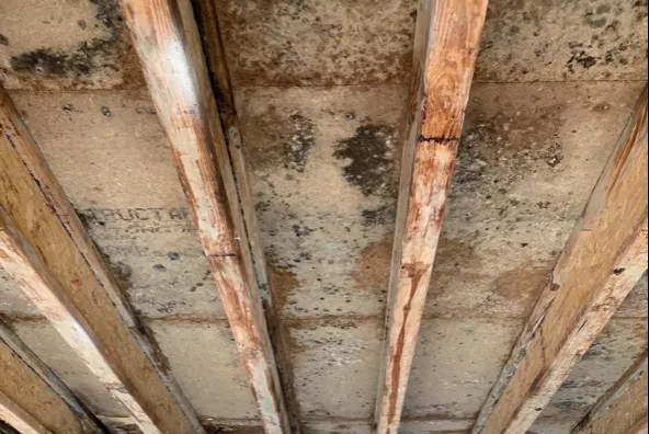The ceiling of a building under construction cleaned with dry ice.